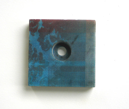 Fragment of blue tile with hole